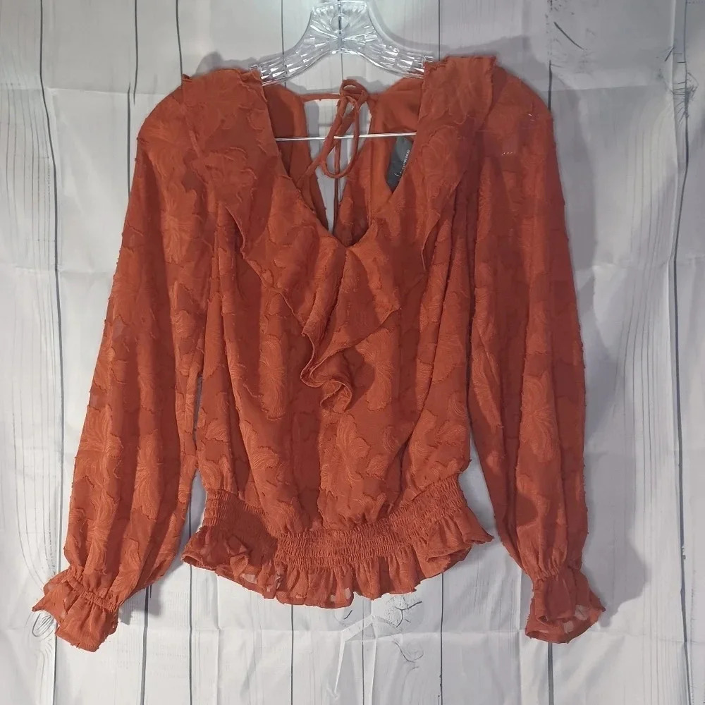 Anthropologie textured floral Ruffle boho blouse